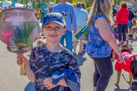 Smiling child at Walk for Animals
